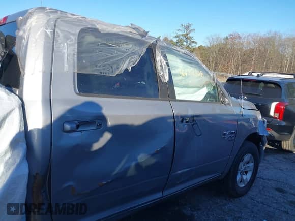 2021 Ram 1500 SLT z VIN 1C6RR7LG7MS532247, wystawiony jako IAAI lot #38329565 z przebiegiem Nie podano mil oraz . Historia ofert i sprzedaży dostępna na DreamBid. Obrazek 14.