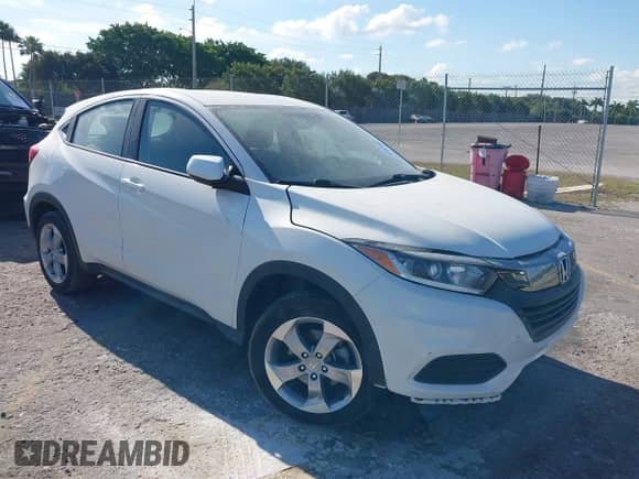 2020 Honda HR-V LX z VIN 3CZRU5H36LM702178, wystawiony jako IAAI lot #41882480 z przebiegiem 74 554 mil mil oraz . Historia ofert i sprzedaży dostępna na DreamBid. Obrazek 1.