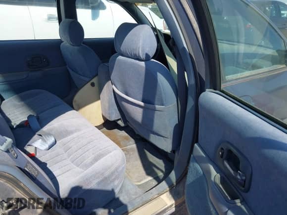 1996 Chevrolet Lumina z VIN 2G1WL52M5T9112066, wystawiony jako IAAI lot #43165152 z przebiegiem 93 151 mil mil oraz . Historia ofert i sprzedaży dostępna na DreamBid. Obrazek 8.