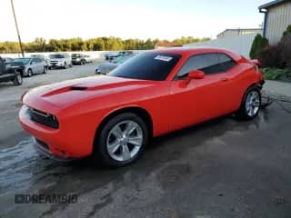 2020 Dodge Challenger SXT with VIN 2C3CDZAG1LH198903, listed as a Copart auction lot 68770445 with 64,008 mi miles and Salvage title. Bid and sale history available at DreamBid. Image 1.
