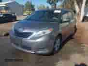 2014 Toyota Sienna LE AAS with VIN 5TDKK3DC5ES464205, listed as a IAAI auction lot 43066275 with 194,999 mi miles and . Bid and sale history available at DreamBid. Image 19.