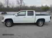 2011 Chevrolet Colorado 1LT z VIN 1GCHTCFE6B8141559, wystawiony jako IAAI lot #41812559 z przebiegiem 147 848 mil mil oraz . Historia ofert i sprzedaży dostępna na DreamBid. Obrazek 14.