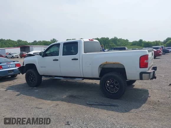 2013 Chevrolet Silverado 2500HD Work Truck with VIN 1GC1KVCG3DF101802, listed as a IAAI auction lot 42395316 with 150,873 mi miles and . Bid and sale history available at DreamBid. Image 14.