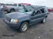 2004 Jeep Grand Cherokee Laredo with VIN 1J4GX48S34C213420, listed as a IAAI auction lot 42221769 with 194,163 mi miles and . Bid and sale history available at DreamBid. Image 2.