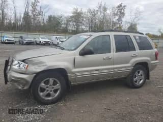 2004 Jeep Grand Cherokee Limited with VIN 1J4GW58N84C322569, listed as a Copart auction lot 85271155 with 238,794 mi miles and Salvage title. Bid and sale history available at DreamBid. Image 1.