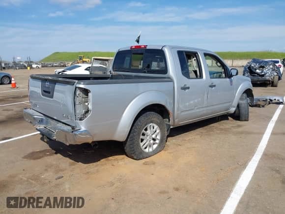 2014 Nissan Frontier S with VIN 1N6AD0EV1EN716684, listed as a IAAI auction lot 41861705 with Not provided miles and . Bid and sale history available at DreamBid. Image 4.