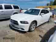 2014 Dodge Charger SE with VIN 2C3CDXBGXEH192832, listed as a IAAI auction lot 42855125 with 99,119 mi miles and . Bid and sale history available at DreamBid. Image 2.
