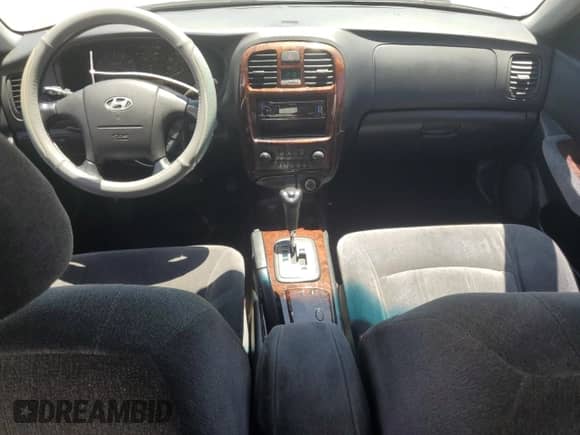 2003 Hyundai Sonata GLS z VIN KMHWF35H33A868884, wystawiony jako Copart lot #61442535 z przebiegiem 129 900 mil mil oraz Szkoda całkowita • Salvage title. Historia ofert i sprzedaży dostępna na DreamBid. Obrazek 8.