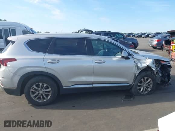 2019 Hyundai Santa Fe SE с VIN 5NMS2CAD3KH082248, выставлен на аукционе IAAI как лот 43286639 с пробегом 95 291 миль миль и . История ставок и продаж доступна на DreamBid. Изображение 13.