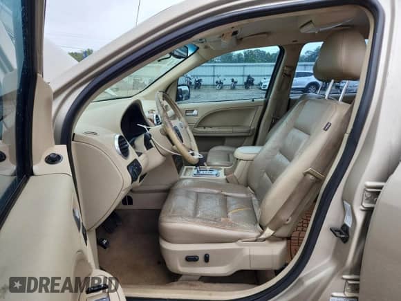 2006 Ford Freestyle Limited с VIN 1FMDK03166GA35458, выставлен на аукционе Copart как лот 63307895 с пробегом Не указан миль и Списание • Salvage title. История ставок и продаж доступна на DreamBid. Изображение 7.