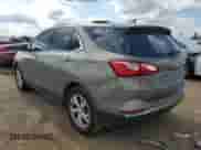 2018 Chevrolet Equinox Premier z VIN 3GNAXMEV8JS531458, wystawiony jako Copart lot #69405575 z przebiegiem 112 739 mil mil oraz Szkoda całkowita • Salvage title. Historia ofert i sprzedaży dostępna na DreamBid. Obrazek 2.