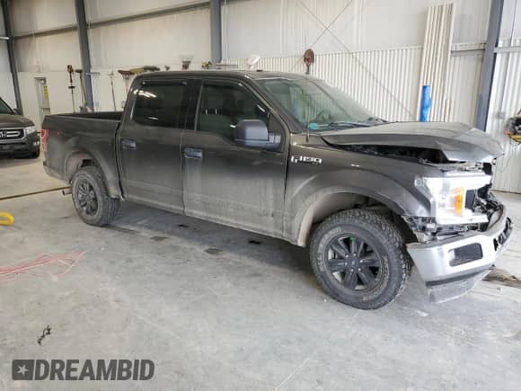 2018 Ford F-150 XLT z VIN 1FTEW1EPXJFD61668, wystawiony jako Copart lot #84369465 z przebiegiem 121 612 mil mil oraz Szkoda całkowita • Salvage title. Historia ofert i sprzedaży dostępna na DreamBid. Obrazek 4.
