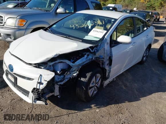 2018 Toyota Prius Two z VIN JTDKBRFUXJ3062023, wystawiony jako IAAI lot #43262351 z przebiegiem 43 884 mil mil oraz . Historia ofert i sprzedaży dostępna na DreamBid. Obrazek 18.