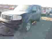 2014 Honda Pilot EX-L with VIN 5FNYF4H70EB002480, listed as a IAAI auction lot 41407191 with 284,659 mi miles and . Bid and sale history available at DreamBid. Image 2.