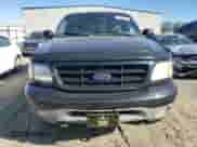 2002 Ford F-150 XL z VIN 1FTRF18232NA58109, wystawiony jako Copart lot #79080674 z przebiegiem 148 213 mil mil oraz Szkoda całkowita • Salvage title. Historia ofert i sprzedaży dostępna na DreamBid. Obrazek 5.