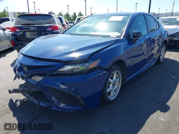 2023 Toyota Camry SE z VIN 4T1T11AK6PU158700, wystawiony jako IAAI lot #43312055 z przebiegiem 49 320 mil mil oraz . Historia ofert i sprzedaży dostępna na DreamBid. Obrazek 2.