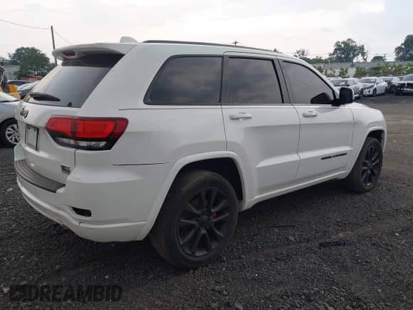 2020 Jeep Grand Cherokee Laredo E with VIN 1C4RJFAG5LC375033, listed as a IAAI auction lot 42415231 with 62,489 mi miles and . Bid and sale history available at DreamBid. Image 4.