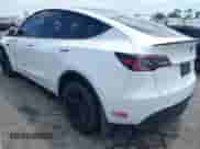 2023 Tesla Model Y Long Range with VIN 7SAYGDEE7PA124885, listed as a IAAI auction lot 43084065 with 22,983 mi miles and . Bid and sale history available at DreamBid. Image 3.