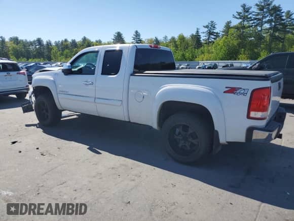 2012 GMC Sierra 1500 SLT with VIN 1GTR2WE74CZ290205, listed as a Copart auction lot 57881645 with 96,022 mi miles and Salvage title. Bid and sale history available at DreamBid. Image 2.