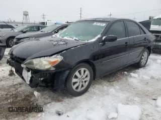 2002 Toyota Camry XLE with VIN JTDBF30K420057170, listed as a Copart auction lot 73232684 with 143,971 mi miles and Salvage title. Bid and sale history available at DreamBid. Image 1.