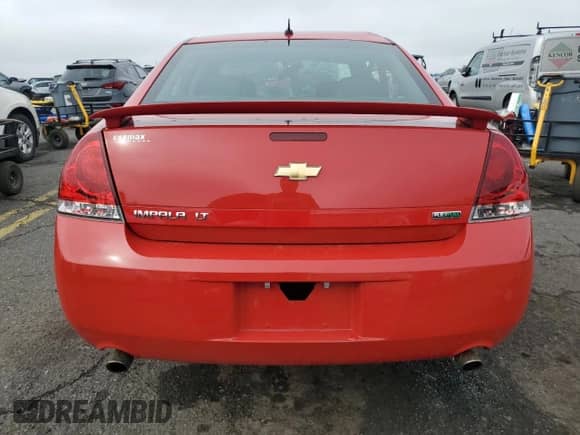 2012 Chevrolet Impala LT Retail with VIN 2G1WB5E37C1113479, listed as a Copart auction lot 82107985 with 31,305 mi miles and Salvage title. Bid and sale history available at DreamBid. Image 6.