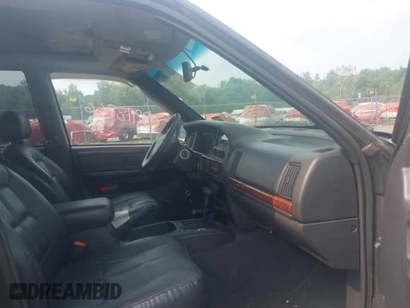 1998 Jeep Grand Cherokee Limited с VIN 1J4GZ78Y4WC261303, выставлен на аукционе IAAI как лот 42918366 с пробегом 115 367 миль миль и . История ставок и продаж доступна на DreamBid. Изображение 5.