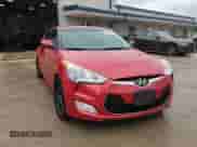 2013 Hyundai Veloster w/Black Int z VIN KMHTC6AD1DU167261, wystawiony jako Copart lot #63744355 z przebiegiem 121 478 mil mil oraz Czysty tytuł • Clean title. Historia ofert i sprzedaży dostępna na DreamBid. Obrazek 13.