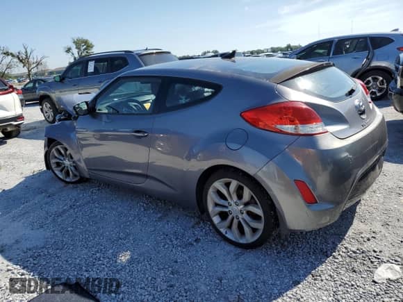 2015 Hyundai Veloster z VIN KMHTC6AD7FU239132, wystawiony jako Copart lot #70582085 z przebiegiem 92 854 mil mil oraz Czysty tytuł • Clean title. Historia ofert i sprzedaży dostępna na DreamBid. Obrazek 2.