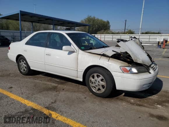 1998 Toyota Camry LE with VIN JT2BF28K3W0130302, listed as a Copart auction lot 68680385 with Not provided miles and Salvage title. Bid and sale history available at DreamBid. Image 4.