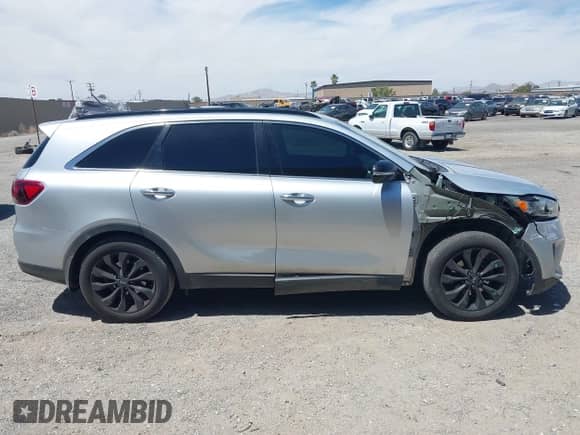 2019 Kia Sorento LX with VIN 5XYPG4A51KG596857, listed as a IAAI auction lot 42292864 with 117,189 mi miles and . Bid and sale history available at DreamBid. Image 13.