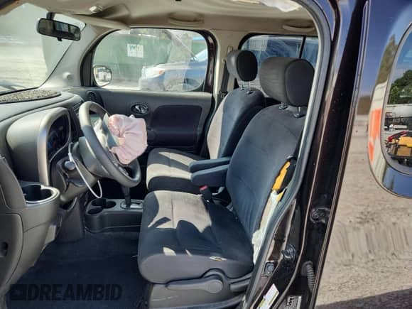 2013 Nissan Cube S z VIN JN8AZ2KR3DT304949, wystawiony jako Copart lot #71396525 z przebiegiem 107 779 mil mil oraz Szkoda całkowita • Salvage title. Historia ofert i sprzedaży dostępna na DreamBid. Obrazek 7.