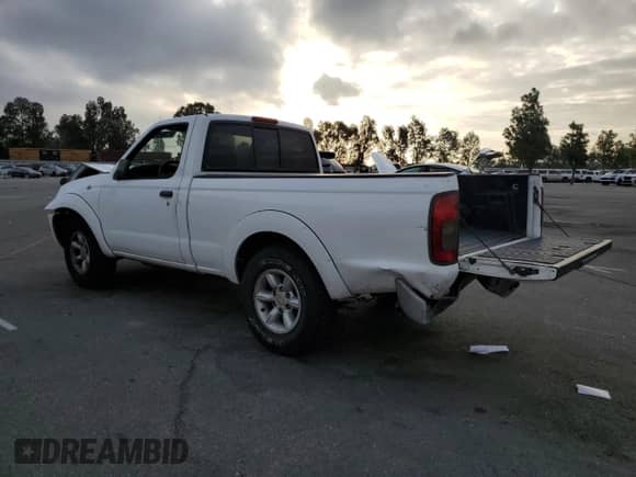 2001 Nissan Frontier XE with VIN 1N6DD21S41C353033, listed as a Copart auction lot 81809955 with 100,722 mi miles and Salvage title. Bid and sale history available at DreamBid. Image 2.