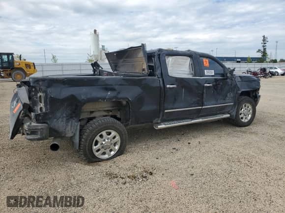 2015 Chevrolet Silverado 3500HD LTZ с VIN 1GC4K0E83FF677902, выставлен на аукционе Copart как лот 58402085 с пробегом Не указан миль и Списание • Salvage title. История ставок и продаж доступна на DreamBid. Изображение 3.