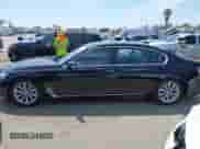 2019 BMW 7 Series 740i with VIN WBA7E2C56KB216989, listed as a IAAI auction lot 42336636 with 113,644 mi miles and . Bid and sale history available at DreamBid. Image 14.