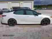 2020 Toyota Camry XSE z VIN 4T1K61AK6LU367572, wystawiony jako IAAI lot #43415552 z przebiegiem 99 436 mil mil oraz . Historia ofert i sprzedaży dostępna na DreamBid. Obrazek 13.