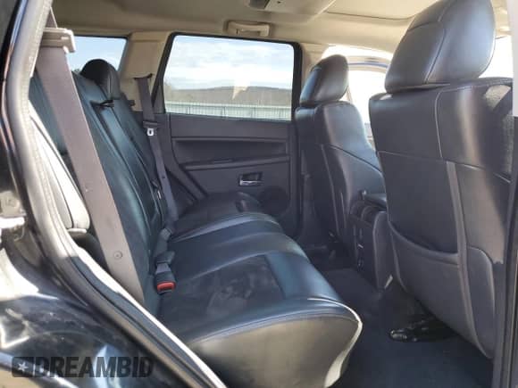 2008 Jeep Grand Cherokee SRT-8 with VIN 1J8HR783X8C157165, listed as a Copart auction lot 49428335 with 134,507 mi miles and Salvage title. Bid and sale history available at DreamBid. Image 12.