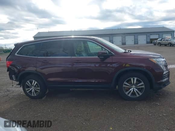 2016 Honda Pilot EX-L with VIN 5FNYF6H8XGB027829, listed as a IAAI auction lot 42072617 with 78,046 mi miles and . Bid and sale history available at DreamBid. Image 14.