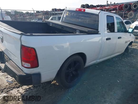 2016 Ram 1500 Tradesman with VIN 1C6RR6FT5GS292848, listed as a IAAI auction lot 42460665 with 127,818 mi miles and . Bid and sale history available at DreamBid. Image 4.