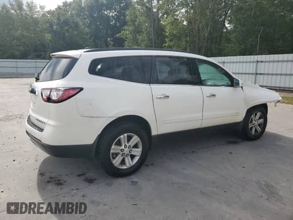 2014 Chevrolet Traverse LT с VIN 1GNKRGKD2EJ319951, выставлен на аукционе Copart как лот 84435595 с пробегом 123 719 миль миль и Списание • Salvage title. История ставок и продаж доступна на DreamBid. Изображение 3.