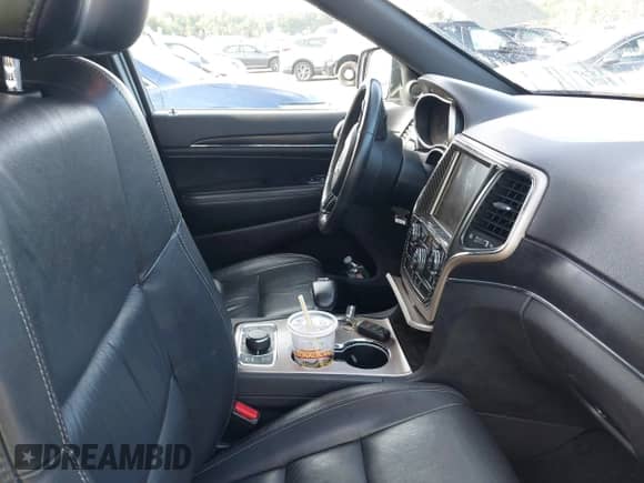 2014 Jeep Grand Cherokee Limited with VIN 1C4RJFBG6EC213526, listed as a IAAI auction lot 43142965 with 142,503 mi miles and . Bid and sale history available at DreamBid. Image 5.
