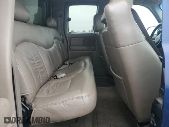 2002 Chevrolet Silverado 1500 LS z VIN 2GCEK19T621134585, wystawiony jako Copart lot #82629095 z przebiegiem 154 674 mil mil oraz Czysty tytuł • Clean title. Historia ofert i sprzedaży dostępna na DreamBid. Obrazek 10.