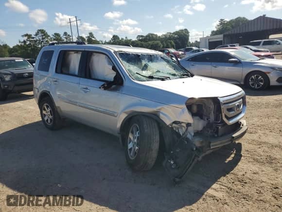 2009 Honda Pilot Touring with VIN 5FNYF38809B002505, listed as a Copart auction lot 61857065 with Not provided miles and Salvage title. Bid and sale history available at DreamBid. Image 4.