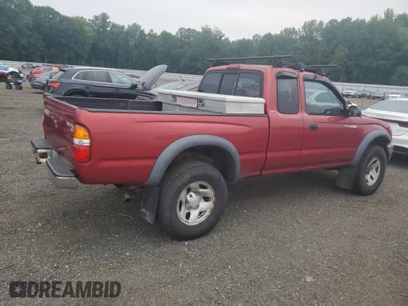 2002 Toyota Tacoma z VIN 5TEWM72N82Z119904, wystawiony jako Copart lot #67544245 z przebiegiem 257 827 mil mil oraz Czysty tytuł • Clean title. Historia ofert i sprzedaży dostępna na DreamBid. Obrazek 3.