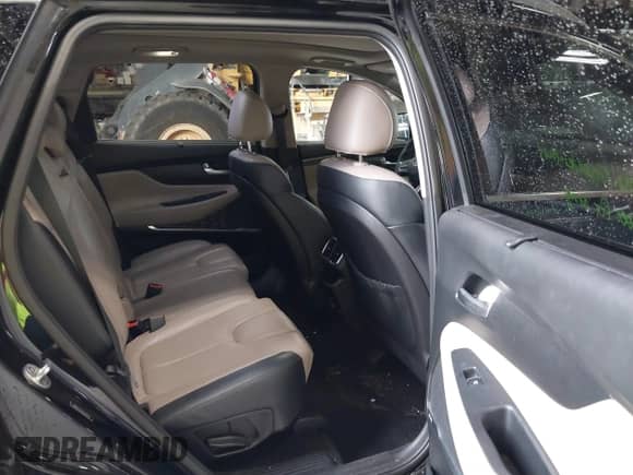 2020 Hyundai Santa Fe SEL with VIN 5NMS3CAD3LH235273, listed as a IAAI auction lot 42751375 with 83,256 mi miles and . Bid and sale history available at DreamBid. Image 8.