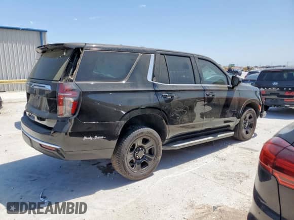 2023 Chevrolet Tahoe Commercial with VIN 1GNSCLEDXPR447042, listed as a Copart auction lot 52399275 with 22,205 mi miles and Salvage title. Bid and sale history available at DreamBid. Image 3.