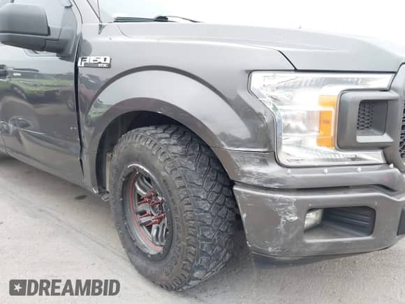 2018 Ford F-150 XL with VIN 1FTEW1CPXJKF05181, listed as a IAAI auction lot 42433178 with 97,101 mi miles and . Bid and sale history available at DreamBid. Image 6.