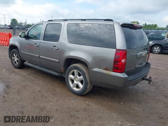 2007 Chevrolet Suburban LTZ with VIN 1GNFK163X7J185794, listed as a IAAI auction lot 42413110 with 129,278 mi miles and . Bid and sale history available at DreamBid. Image 3.