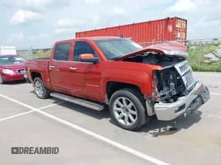 2015 Chevrolet Silverado 1500 LT with VIN 3GCUKREC8FG220011, listed as a IAAI auction lot 42643614 with 135,317 mi miles and . Bid and sale history available at DreamBid. Image 1.