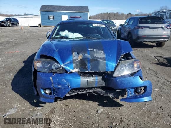 2005 Hyundai Tiburon GT с VIN KMHHN65F35U169736, выставлен на аукционе Copart как лот 47422885 с пробегом 136 205 миль миль и Чистый • Clean title. История ставок и продаж доступна на DreamBid. Изображение 5.