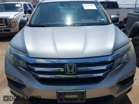 2018 Honda Pilot EX-L with VIN 5FNYF5H61JB008134, listed as a IAAI auction lot 42193142 with 100,254 mi miles and . Bid and sale history available at DreamBid. Image 6.